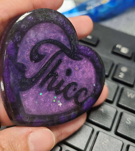 Phone GripsWhat does your heart say?If it's as thicc as your hips or tsundere as your favorite waifu?If so then this is for you!This custom made resin heart is made of food touWitchin Waifu