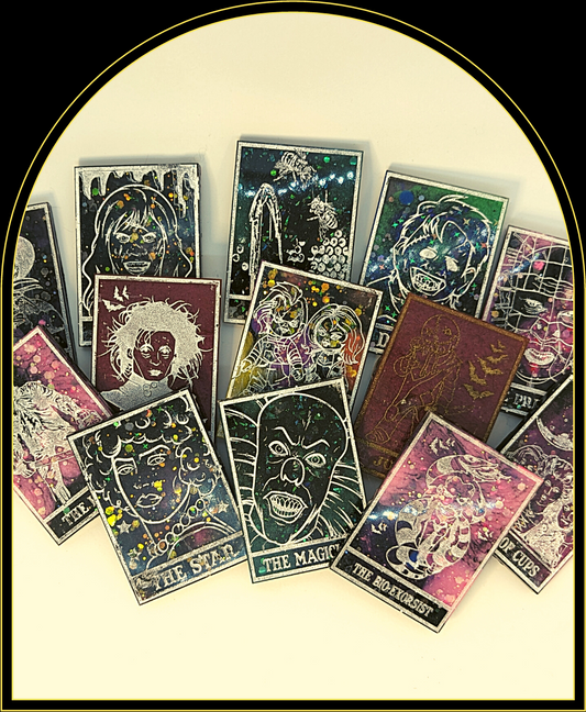 Tarot MagnetsWelcome to your terror-ific abode with these one-of-a-kind Tarot Magnets! These spooky magnets, made from custom resin and inspired by the biggest horror stars, willWitchin Waifu