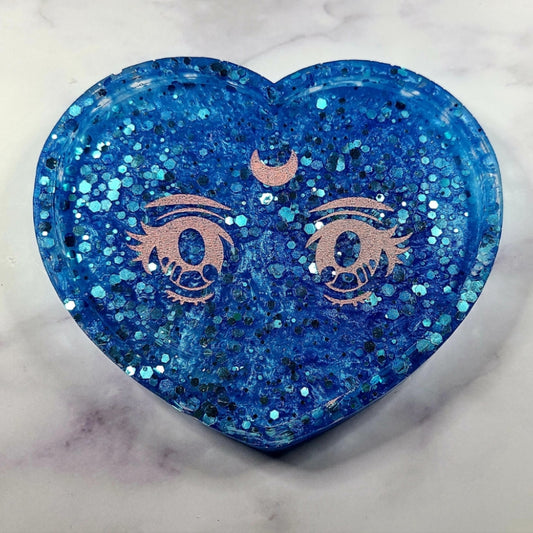 Heart Eyes TraySave the day or at least your table with our custom food safe resin Anime Eyes coaster.Measuring 5" across and 3" in length, this heart shaped lipped coaster comes iWitchin Waifu