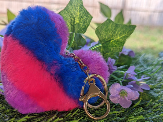 Heart FluffyLook your best in our Heart Fluffy, complete with a vibrant pompom in the colors of the pride flag! Show off your support for the LGBTQIA+ community in style with thWitchin Waifu