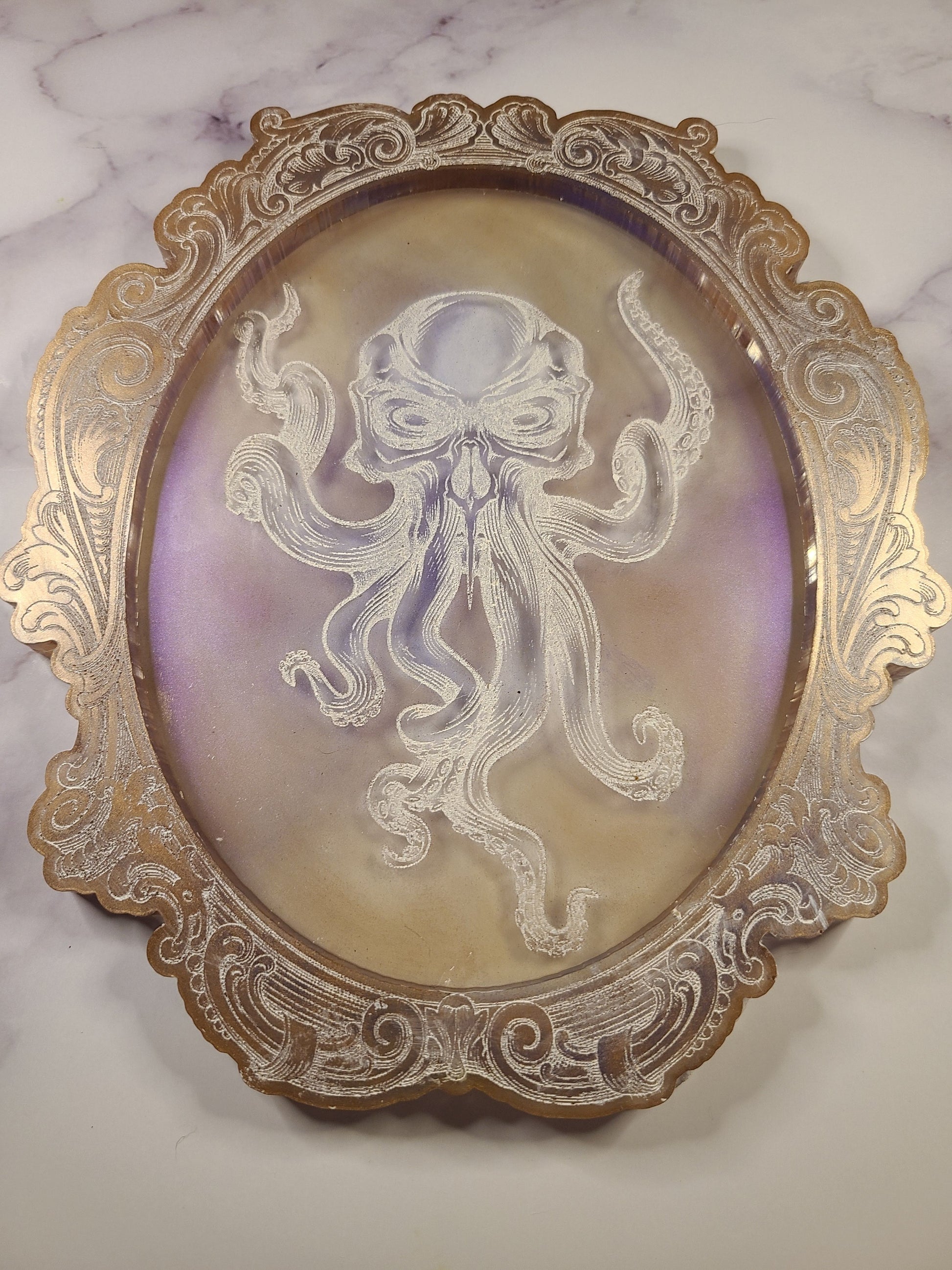 Victorian Gothic Cthulhu Resin Portrait Wall Art TrayWhen the old gods come back, why not impress our massive tentacles overlord with a one of a kind decorative tray.This handmade resin tray measures 8×6.5 in and is maWitchin Waifu